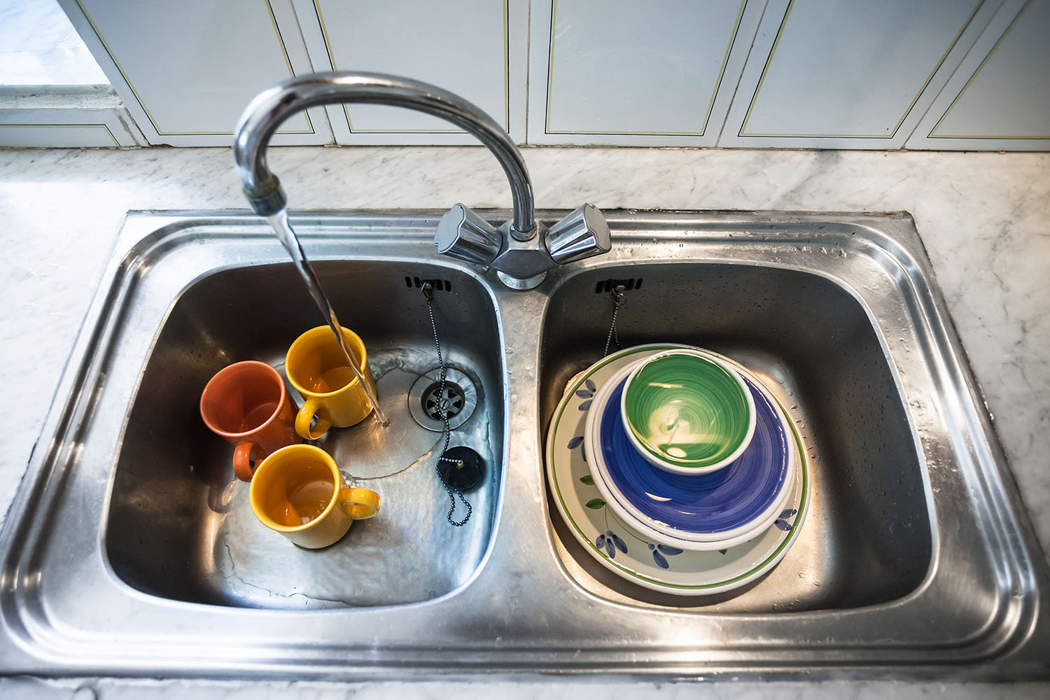 Dirty dishes in kitchen sink